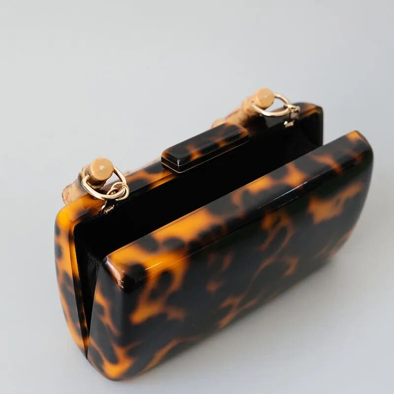Pochette ambre acrylique léopard