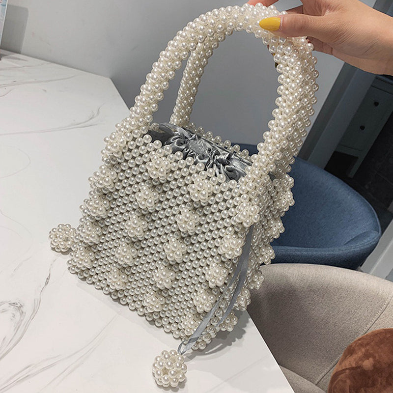 Bolsas artesanais com miçangas