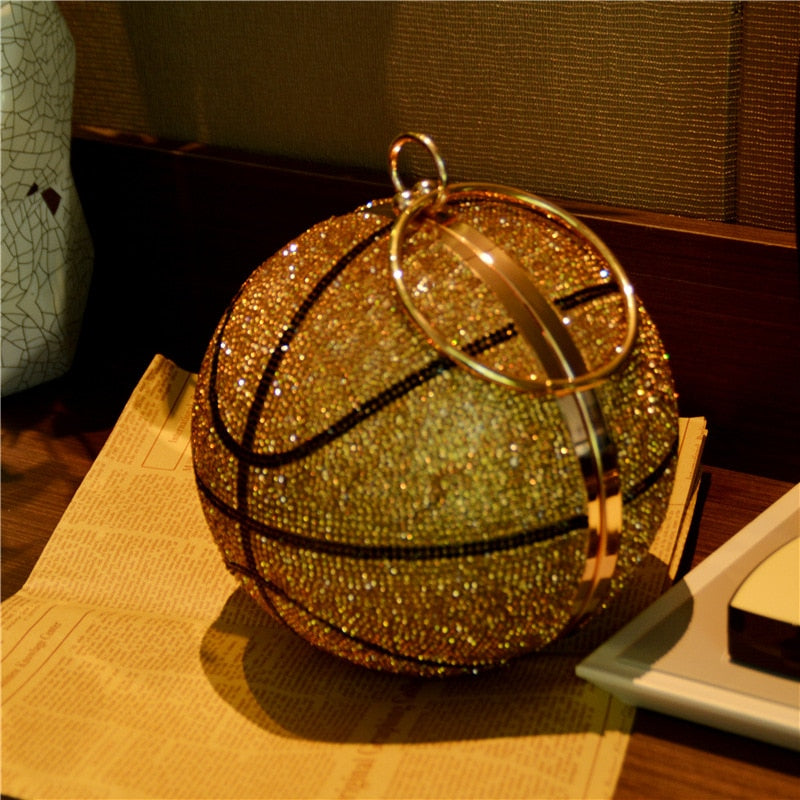Pochette dorée en forme de ballon de basket