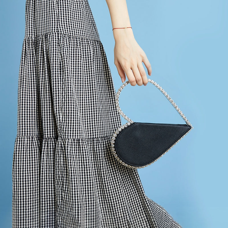 Sac à main pochette demi-cœur