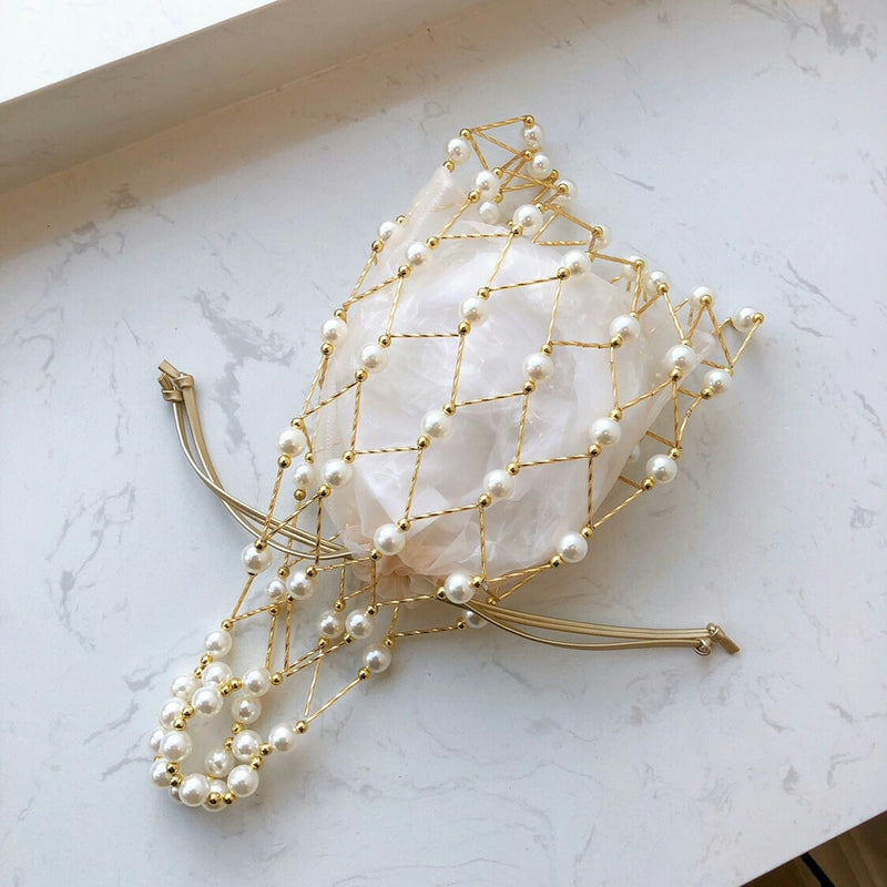 Hand-Woven Pearly Clutch